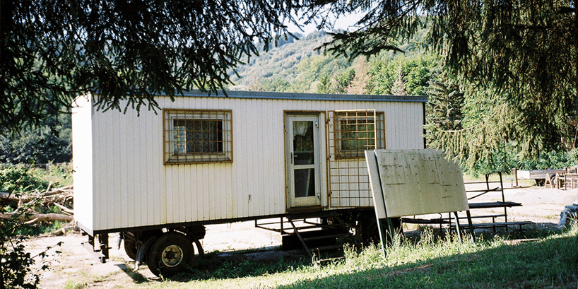 mobile home on grassy field
